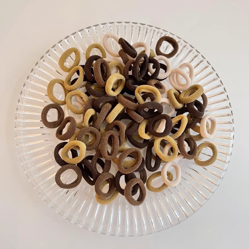 Bebés color caramelo de alta elasticidad pulgar anillo de cabello de niñas adornamiento de cabello de dopamina no daña banda de goma de cabello