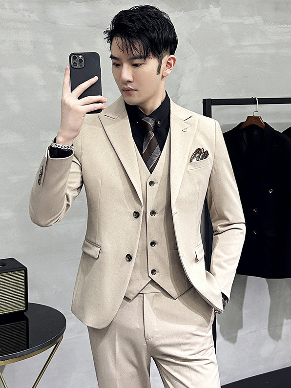 外国貿易の卸売りの男性のスーツの3つのセットの新郎のドレスの韓国版の修身の大きいサイズのスーツのスーツのスーツのペンダント感は無料です。