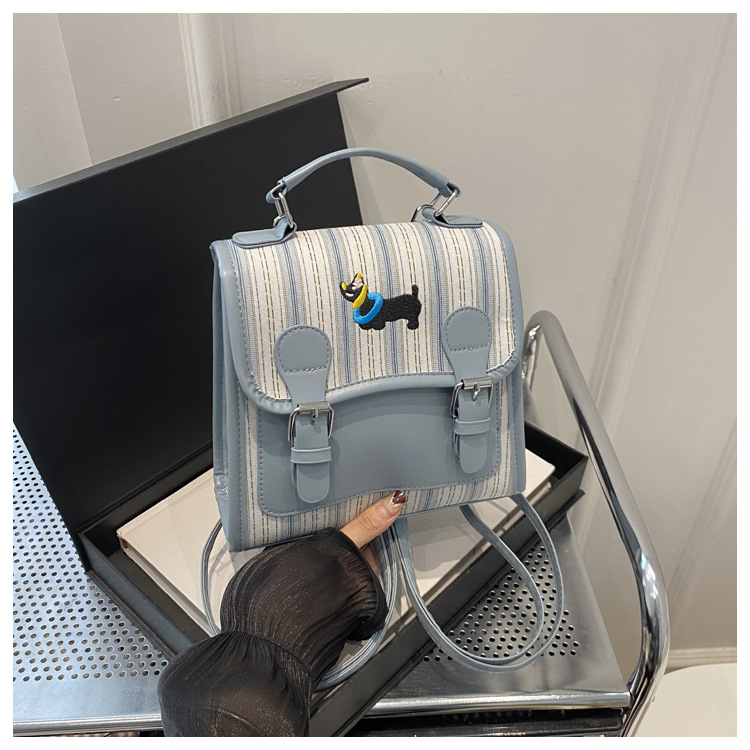 The new backpack for the autumn of 2024 is a fashionable and simple hand-held student single-shoulder bag with a checkered lid and a retro crossbody style undefined