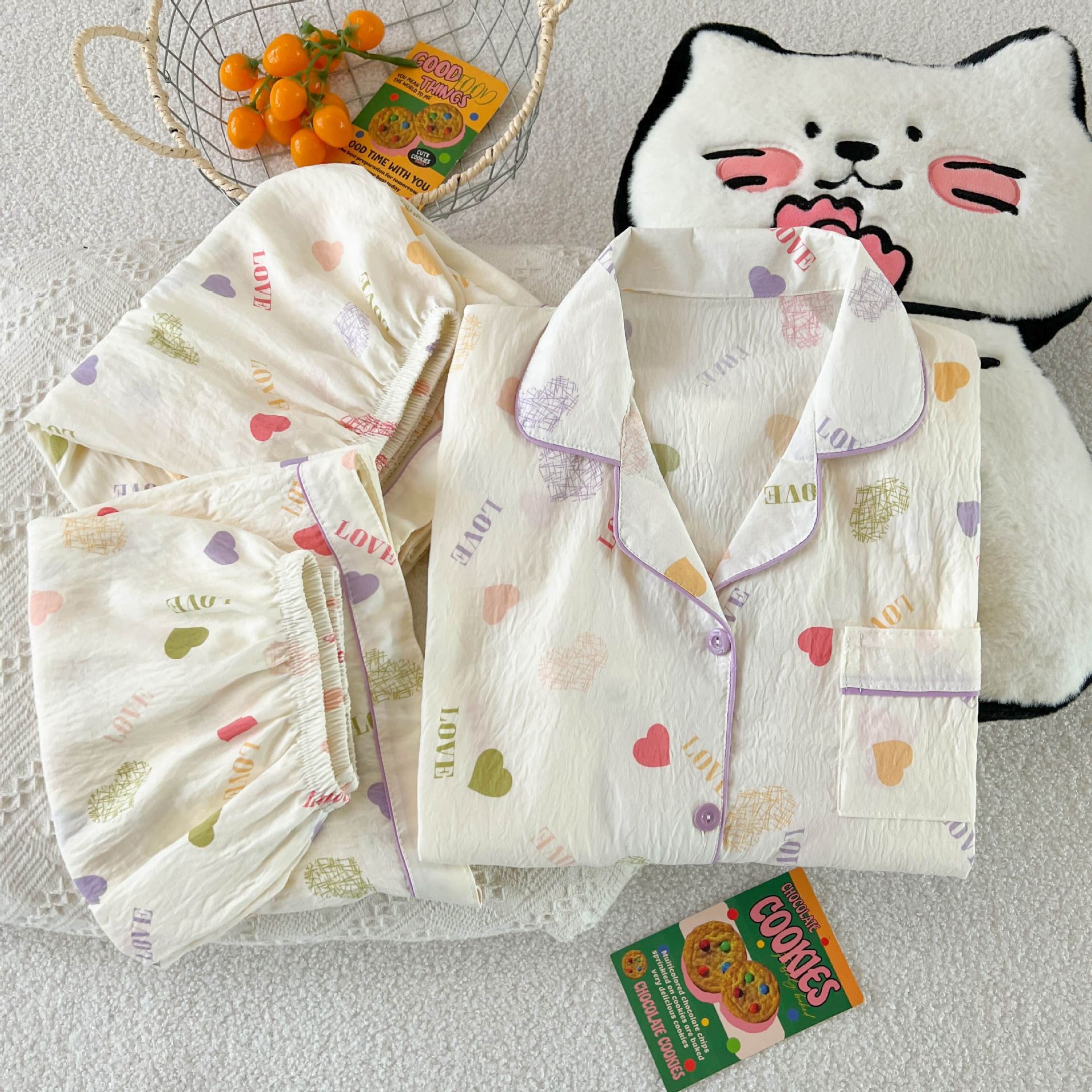 Al por mayor transfronterizo nuevo pijama de mujer tres piezas cardigan con solapa mangas cortas pantalones cortos KT gato dibujos animados cubierta de ropa doméstica