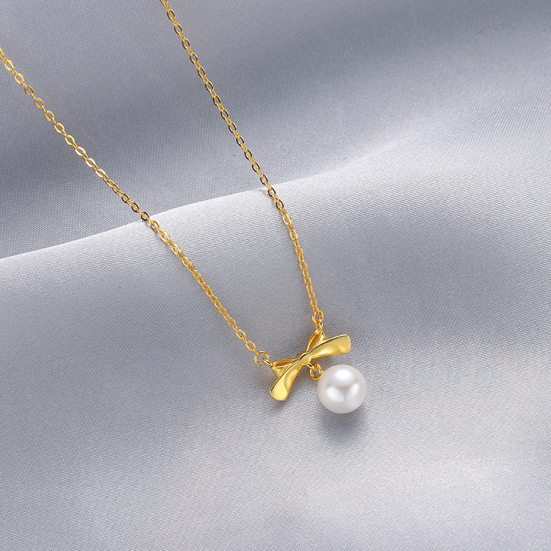 Nueva moda arco colgante Corea del Sur s925 plata esterlina perla collar femenino nicho diseño cadena clavícula