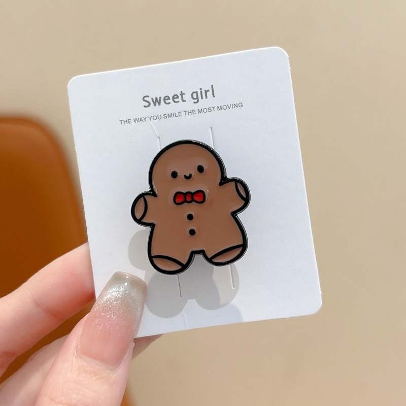 Broche de aleación de sentido avanzado japonés nueva insignia de personalidad de moda femenina de dibujos animados bolsa de Navidad accesorios de metal al por mayor