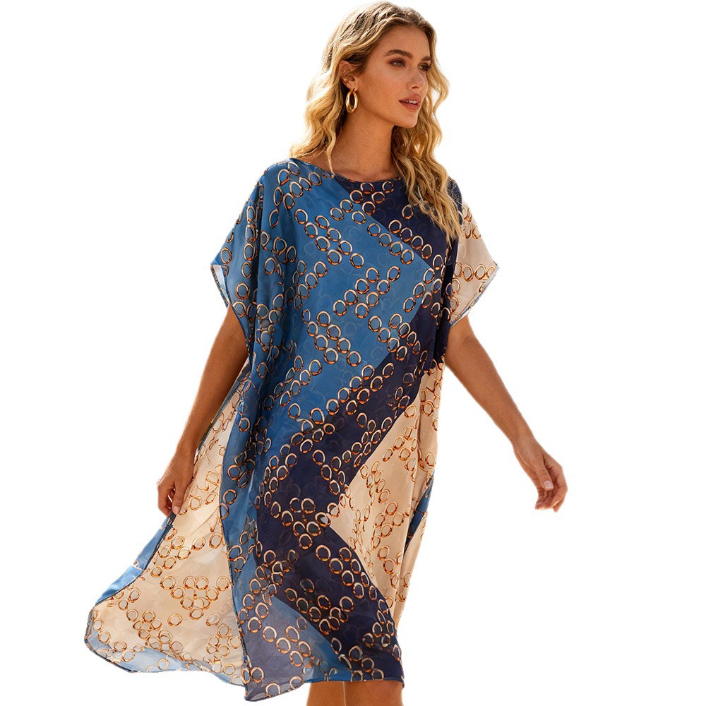 2026 explosión de ropa de moda europea y americana de playa bikini blusa elegante falda protectora solar chal flores vacaciones