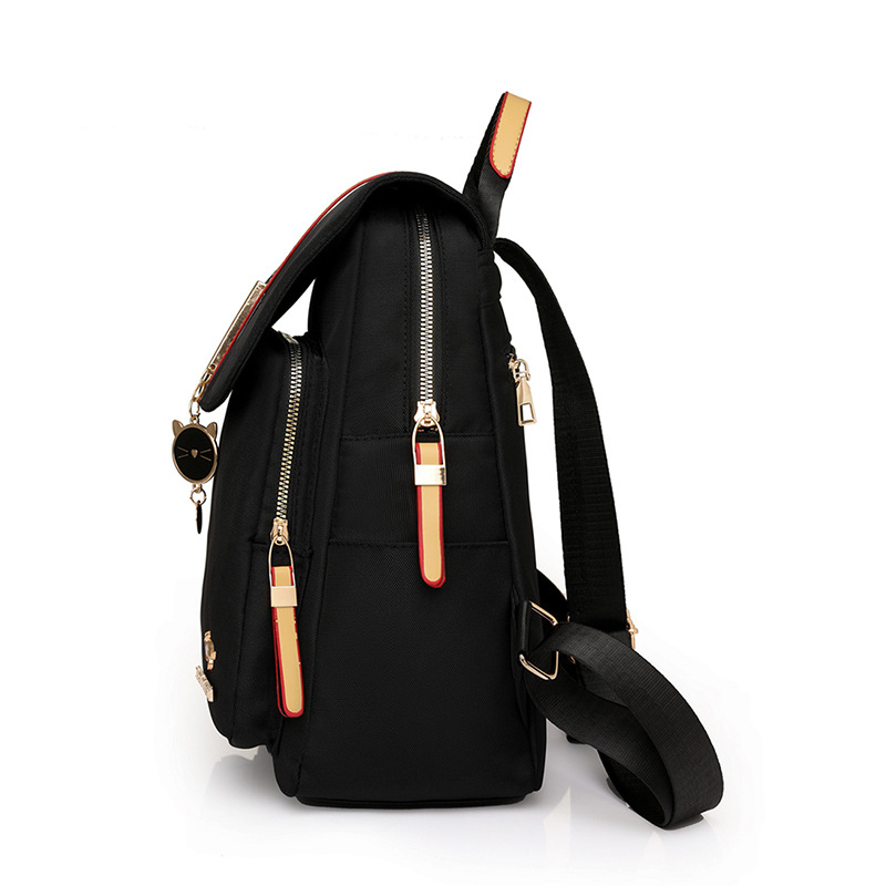 Mochila de nailon simple para mujer 2024 nueva mochila para mujer de viaje de mediana edad, moda de todo fósforo, mochila de gran capacidad, marea