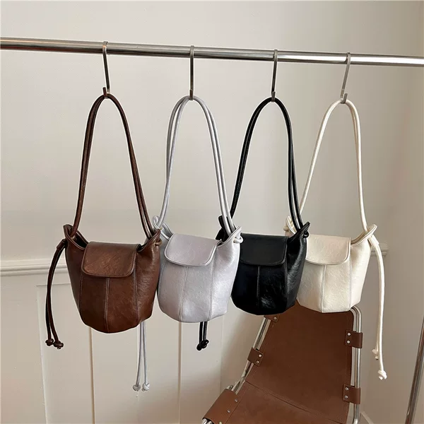 Korean-style niche retro women's bag 2026 new model simple versatile pumpkin bag shoulder crossbody bag high-end bucket bag