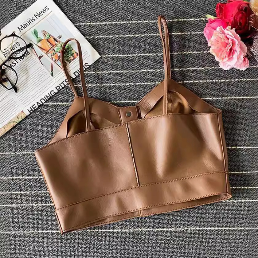 Las niñas de primavera y otoño nuevo retro pu cuero camisola niños de moda de una sola fila oculta hebilla de cuero Chaleco Corto Top moda