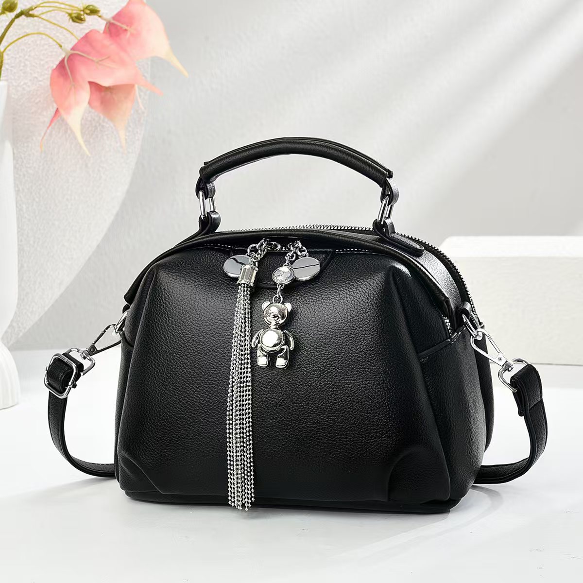 Patrón de lichi de cuero suave de moda salvaje 2025 nuevo bolso de viajero bolso de hombro de gran capacidad retro de verano