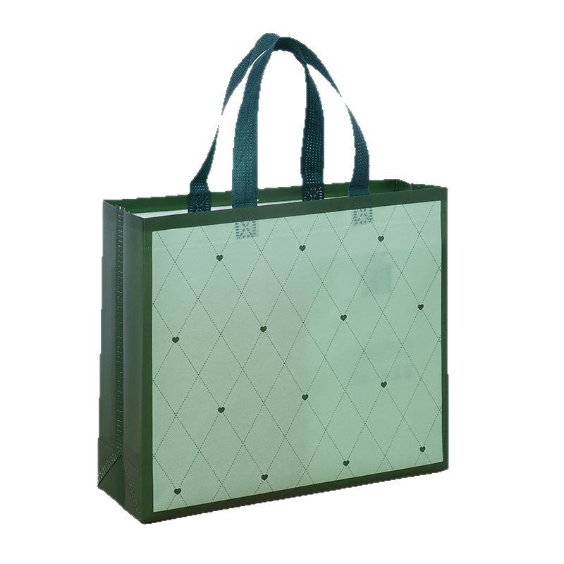 Bolsas de tela no tejida cubiertas de amor verde personalizadas atmósfera simple de alto valor de color bolsas de hombres y mujeres clásicas impermeables engrosadas