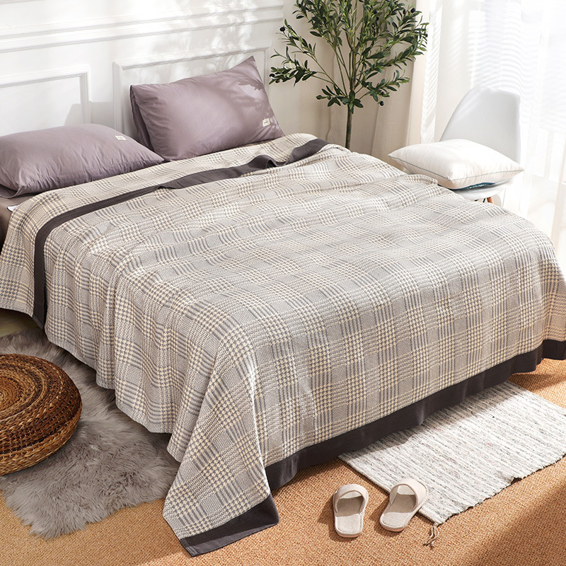 Cozy blanket draped on a sofa