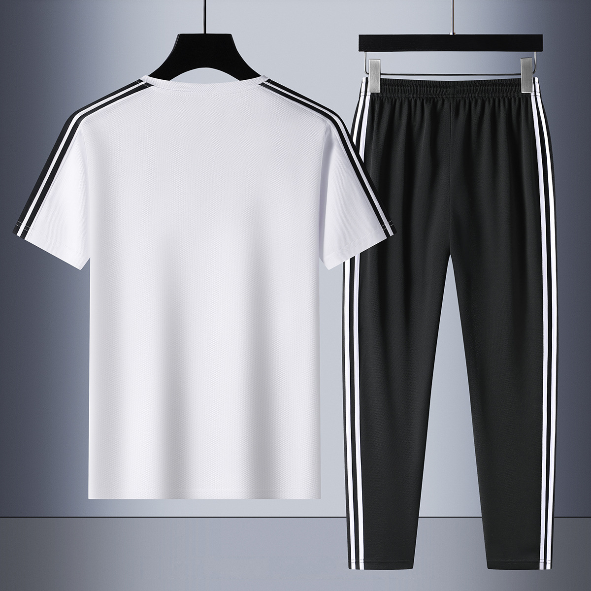 Set de tres barras de verano de moda para hombres, mangas cortas transpirables, pantalones casuales rectos para hombres, set de dos piezas.