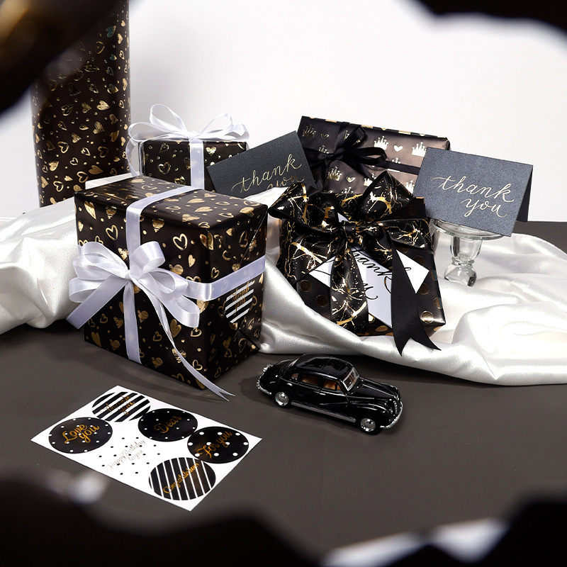 Transfronterizo especial para papel de embalaje de regalo de oro negro, regalo de cumpleaños de San Valentín, papel de regalo de lujo ligero, rollo de gran tamaño