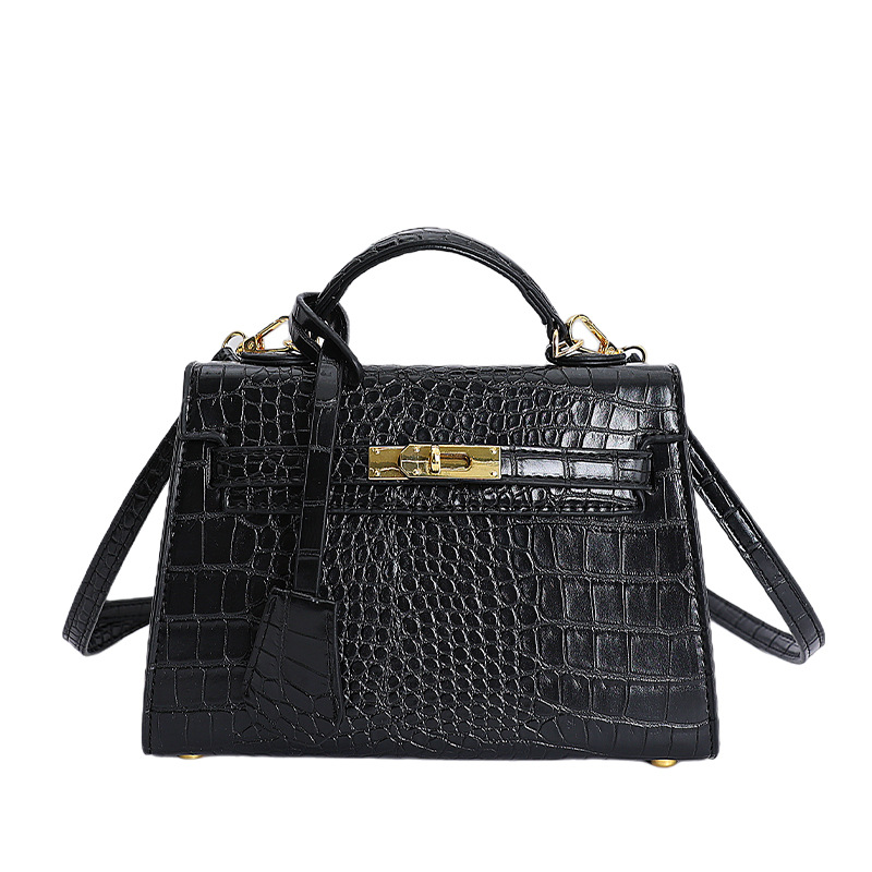 Bolso de mano caliente para mujeres 2025 nuevo estilo transfronterizo de alto nivel con patrón de cocodrilo lujoso y versátil bolso de hombro