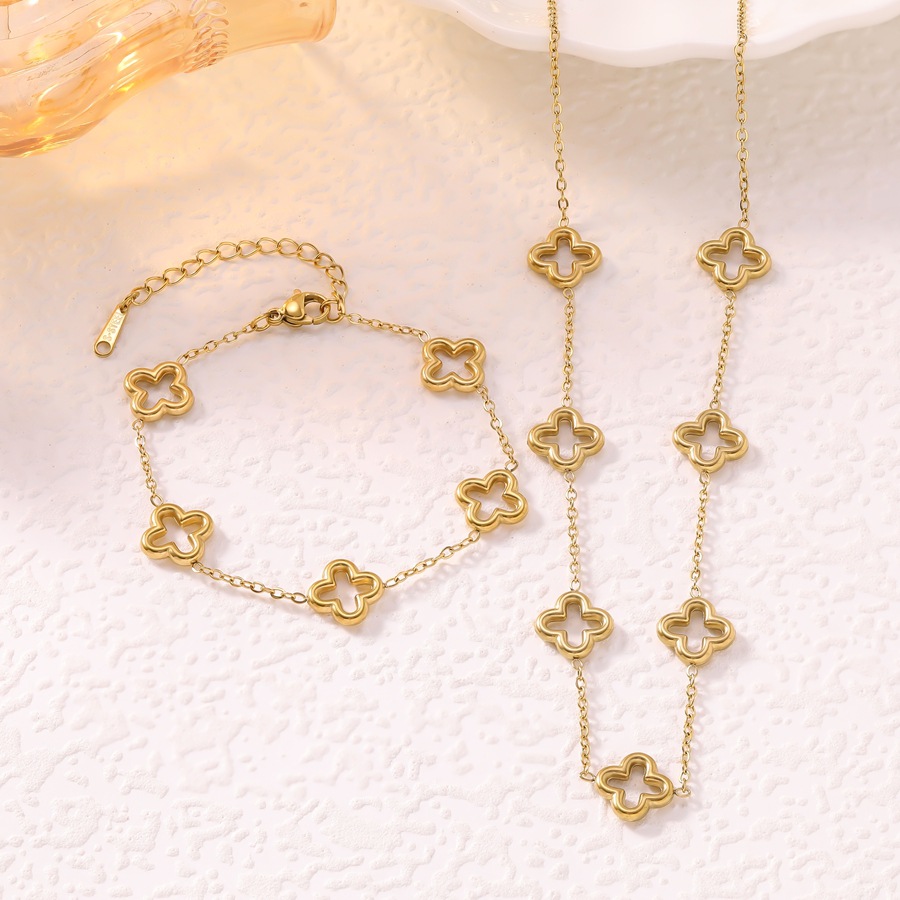 Cross-Border Hot-Selling Vacuum-Plated 18K Gold Stainless Steel Hollow Four-Leaf Clover Bracelet and Necklace Set for Women, Factory Ready Stock Wholesale