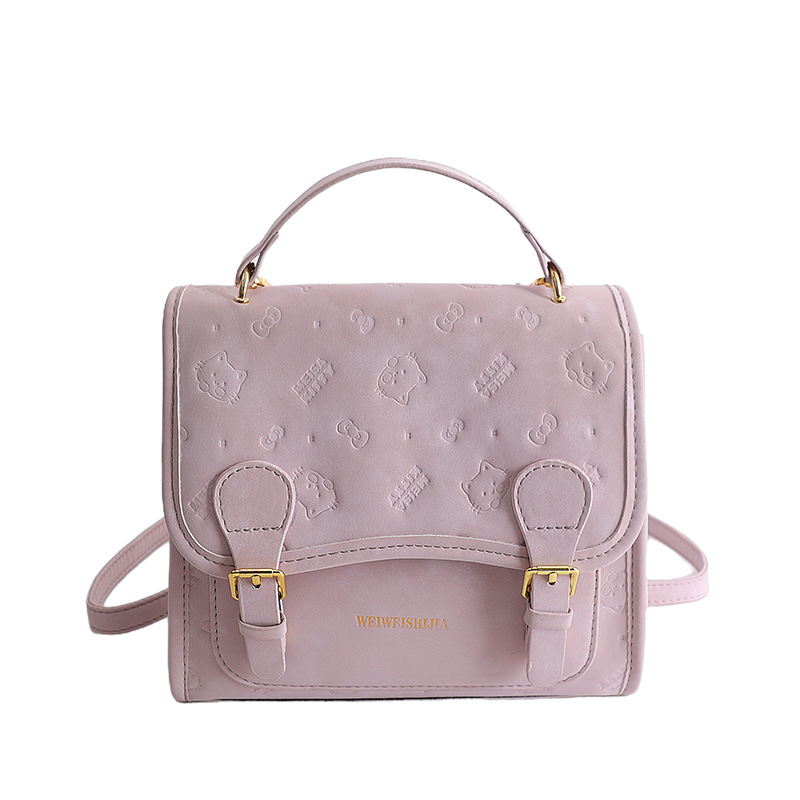 Mochila retro estilo universitario de doble hebilla 2026 nueva moda diaria sensación de bolso de viaje mochila en relieve