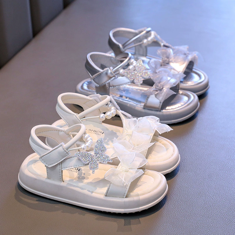 Пляжные сандалии для девочек 2025 лето новый детский блестящий бант девушка обувь принцессы корейская версия сладкие сандалии