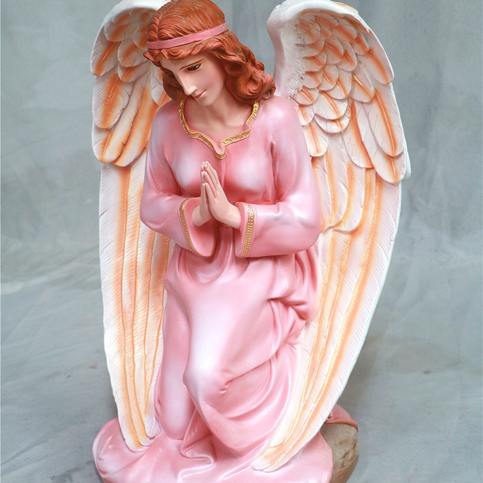 70cm de rodillas ángel mano