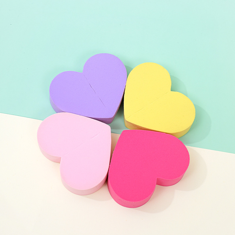 Fábrica personalizada de polvo en forma de corazón almohadilla de aire de amor de桃ar herramientas de maquillaje de doble cara esponja de huevo de maquillaje no comer polvo