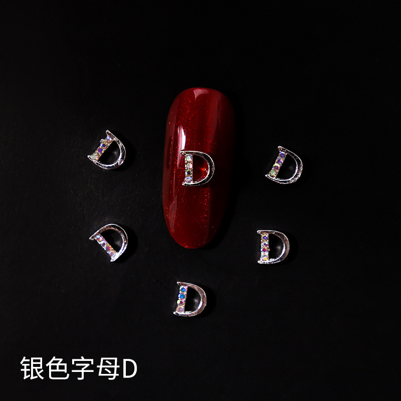 Nueva LZ manicura 26 letras aleación joyería estilo japonés Internet celebridad plata letras manicura joyería clavo Taladro