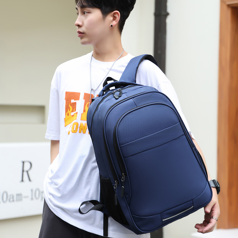 跨境新款男士商务双肩背包时尚休闲学生书包背包多分层一件代发