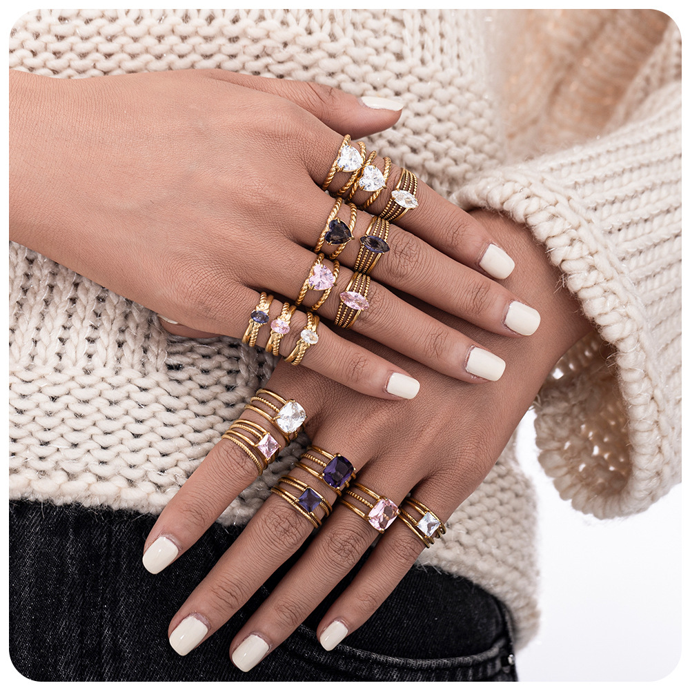TENA oro de 18 quilates de color zirconos viento de alta calidad anillo de lujo ligero de moda joyas de acero inoxidable