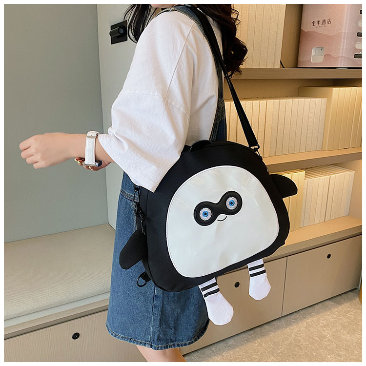 The new 2024 children's egg-shaped party backpack is a cute cartoon canvas single-shoulder bag and a fashionable and stylish small backpack undefined