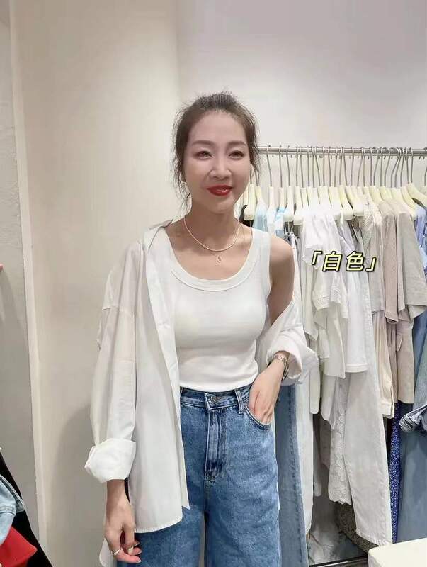 Guangzhou shisanxing Korean boss's same anti-exposure vest slimming solid color camisole for women