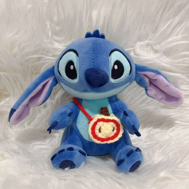 かわいいスティッチのストラップの頭カバーの子供服は、バッグのストラップのアクセサリーを着て、熊料理鼠の誕生日豚を自嘲します。|undefined