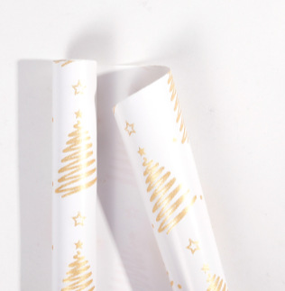 Rollo de papel de regalo de Navidad transfronterizo paquete de tubo de papel de regalo de árbol de Navidad de copo de nieve de oro negro rollo de gran tamaño sentido avanzado
