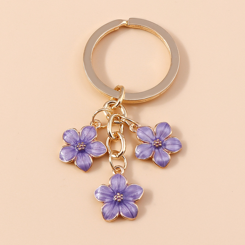 Dulce chica corazón flor de cerezo llavero simple Flor del ciruelo flor teléfono móvil bolso colgante decorativo joyería