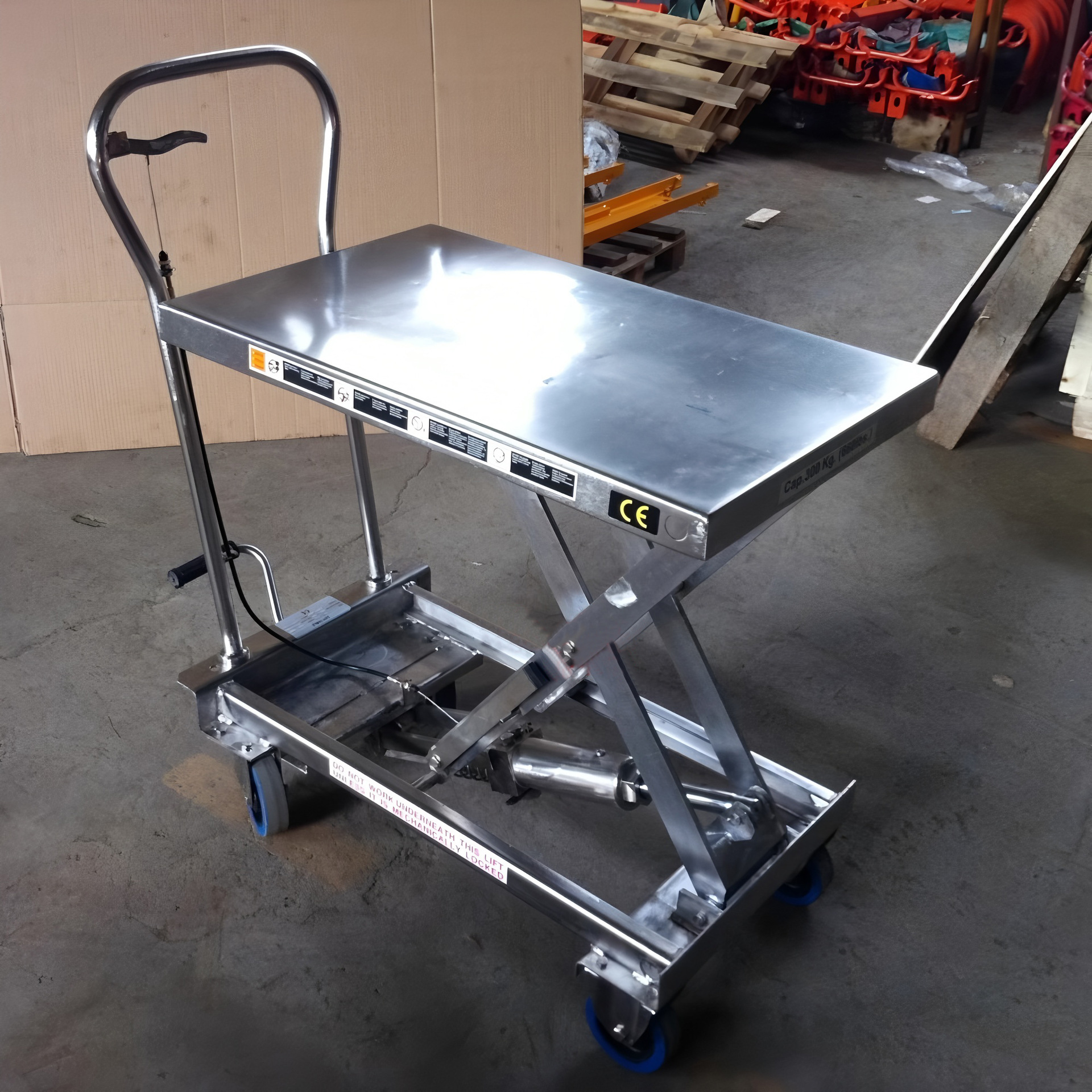 Elevación eléctrica móvil pequeño elevador de mano 304 acero inoxidable elevación hidráulica plataforma de automóvil fábrica de alimentos y medicamentos