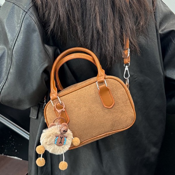 复古手提保龄球包包女2025新款秋冬潮韩国小方包仿鹿皮单肩斜挎包