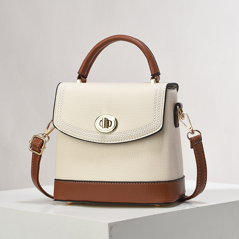 Bolso de mujer nuevo nicho de diseño texturizado bolso de hombro de moda moda bolso de mano práctica mochila bolsas