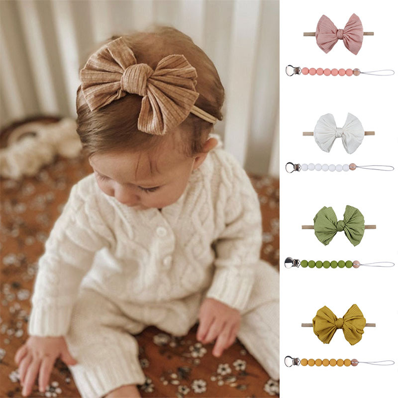 Accesorios para el cabello del bebé de Europa y América del arco de nylon banda para el cabello bebé suministros bebé chupete de silicona pezón anti-caída traje de cadena
