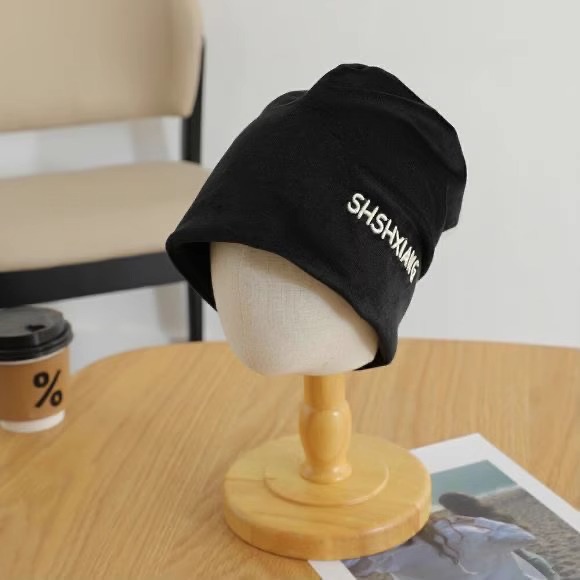 Hombres y niñas sombreros de moda de otoño de algodón húmedo para niños estilo extranjero sombreros de pila de estilo jardín de infantes negros a prueba de viento orejas