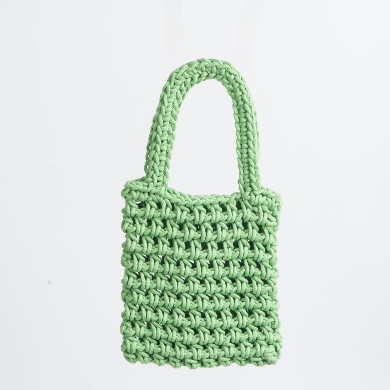 Redes de pesca perforadas tejidas a mano bolsos de teléfono móvil bolsos de moda casuales bolsos de playa de vacaciones de verano de punto