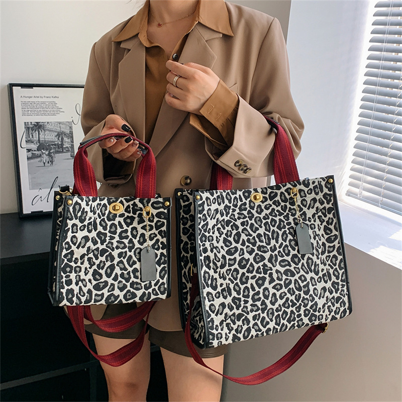 Bolso con estampado de leopardo para mujer 2024, nuevo bolso tote retro de moda para ir al trabajo, con hebilla texturizada, bolso bandolera de un solo hombro.