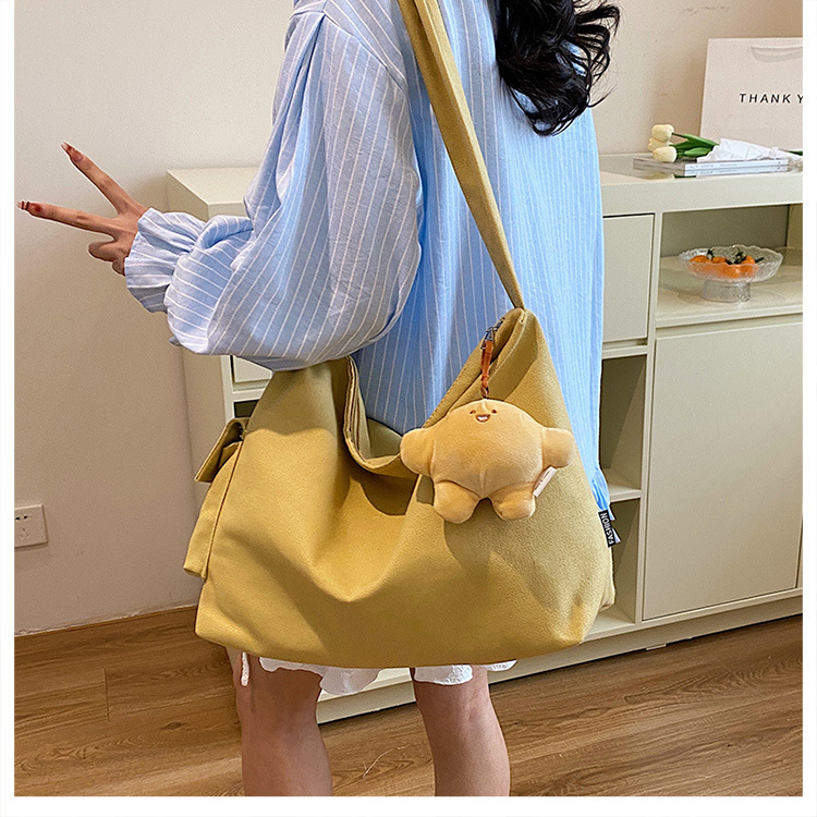The 2024 new Korean-style simple and laid-back casual canvas crossbody bag and the large-capacity versatile tote bag are selling well undefined