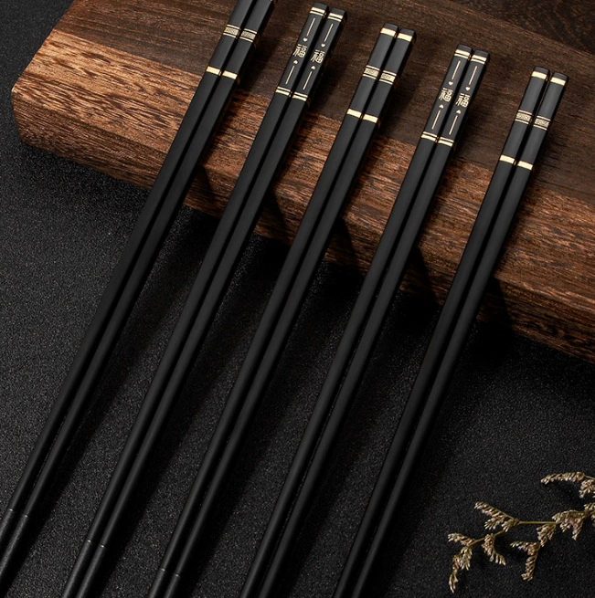 Internet celebrity hot-selling black gold-plated chopsticks for home use with Chinese style blessing alloy chopsticks, non-mouldy chopsticks, 5 pairs