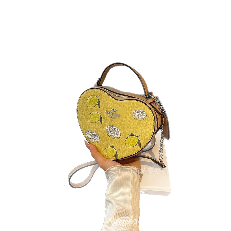 Bolso de mano en forma de corazón de comercio exterior, bolso de hombro de impresión de moda creativa, bolso de hombro simple, bolso de hombro de dama de Europa y América.