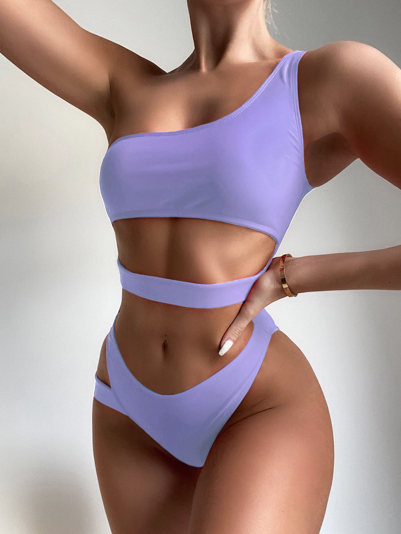 Solid Color Irregular Hollow One-Piece Swimwear NSCMB108618