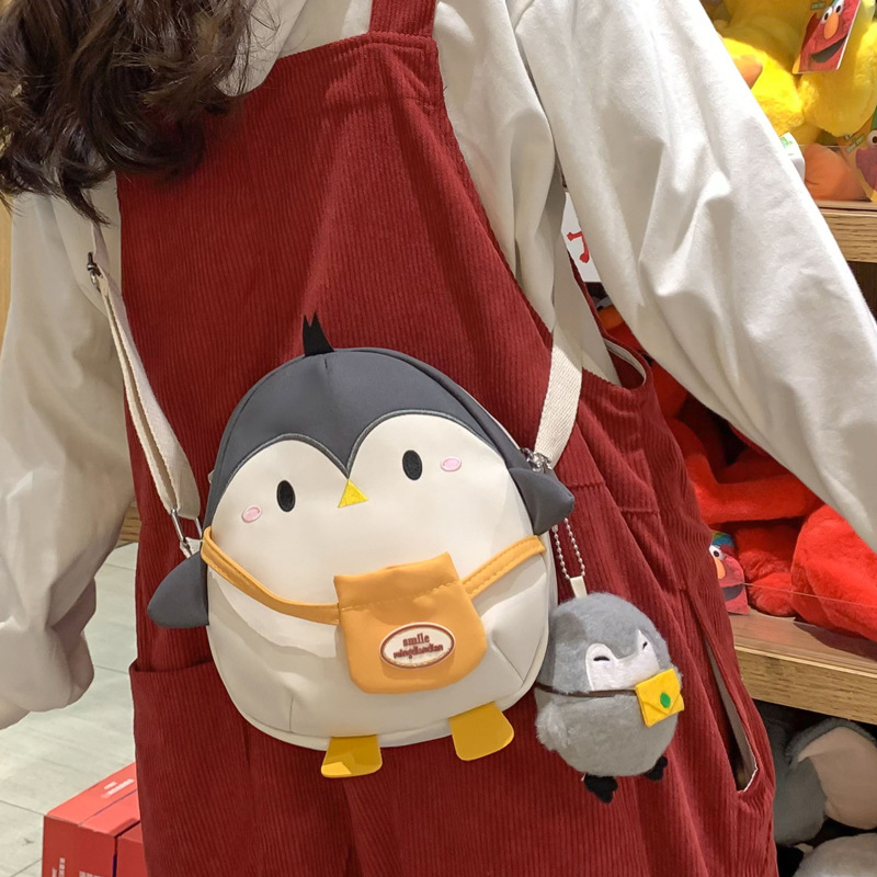 企鹅卡通斜挎包女可爱jk少女背包玩偶包尼龙包单肩小包包