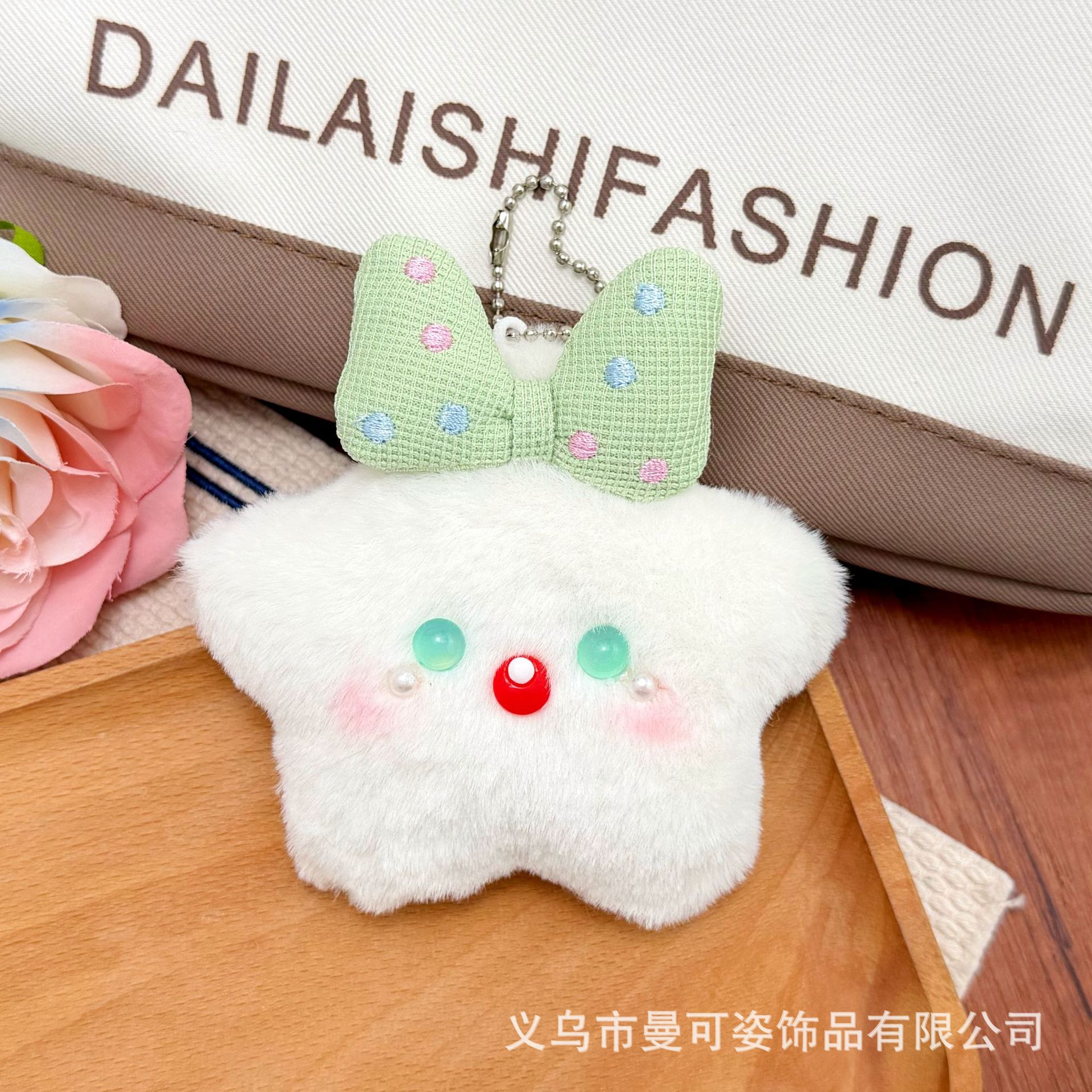 Green polka dot bow with star-shaped mouth