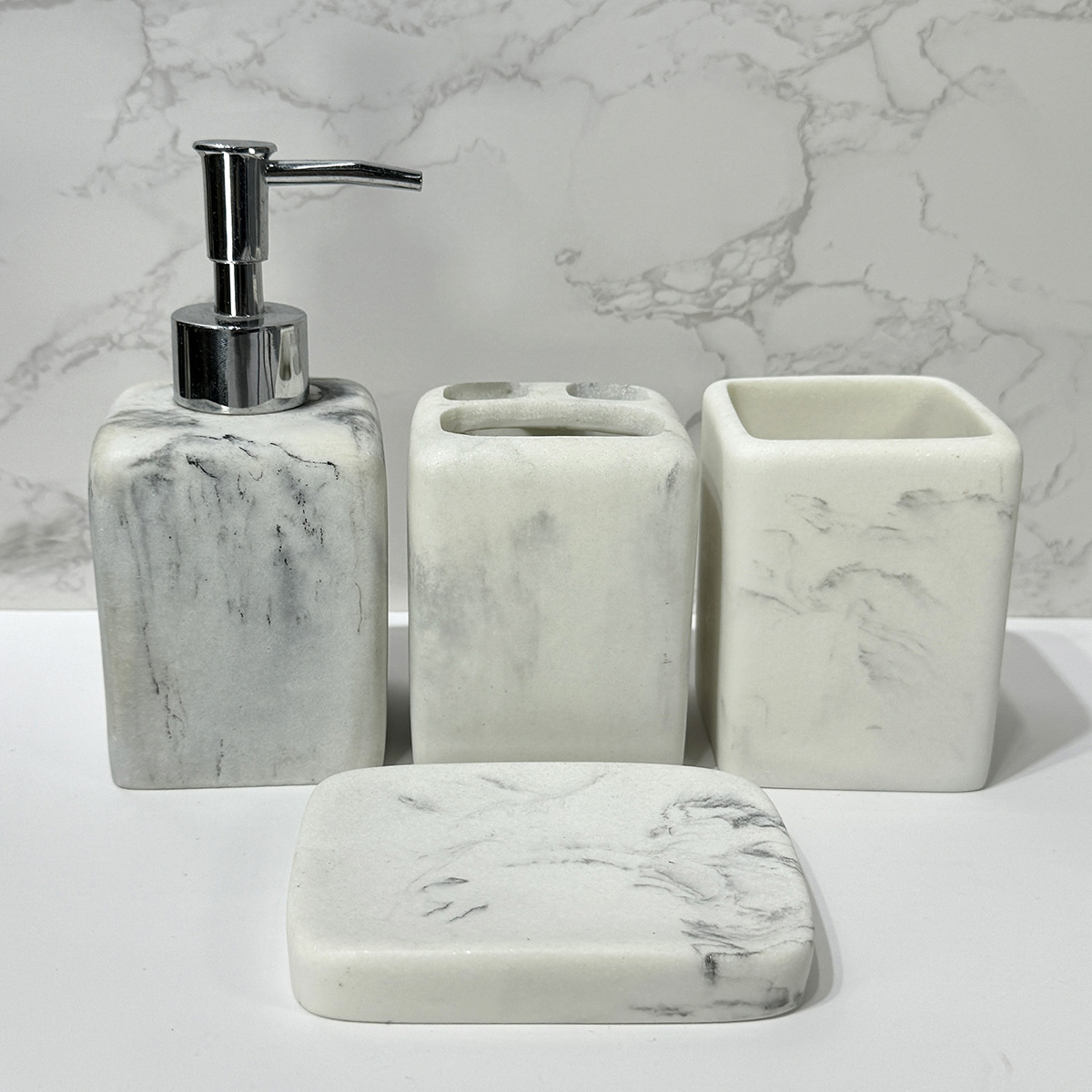 Taza de enjuague bucal de mármol Juego de baño Botella de prensa de resina Juego para el hogar Juego de cuatro piezas de almacenamiento de baño de hotel