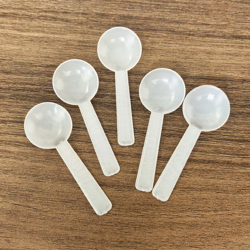 Fabricante 1/2/3/5/10g de leche en polvo cuchara creativa cocina Doc pequeña cuchara fija LOGO cuchara de medición de plástico al por mayor