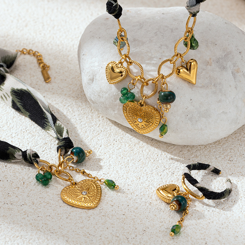 Tina Europa y los Estados Unidos transfronterizos en el viento de moda amor colgante collar de pecado pendientes de corazón de melocotón anillo joyas al por mayor