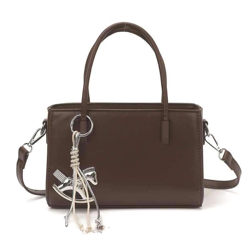 Diseño coreano de nicho bolso de mano casual para mujeres 2026 verano diario nuevo estilo de moda bolso de transporte