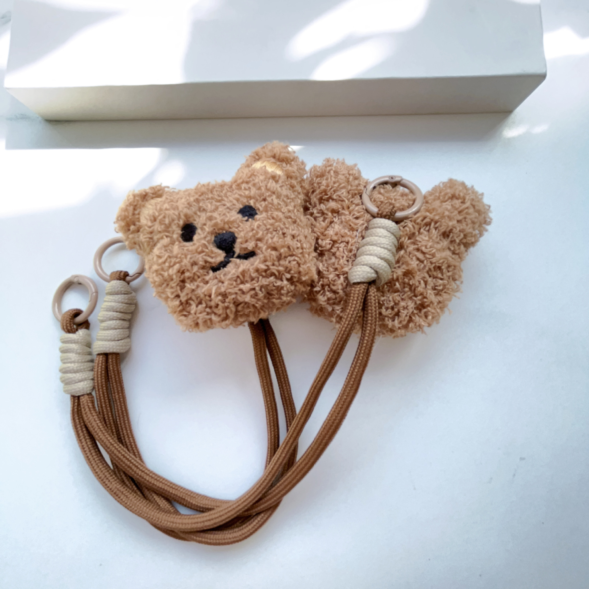 ins coreano lindo peluche oso general caso de teléfono móvil cuerdas de mano marrón Kitty cinturón de muñeca anti-perderida colgante