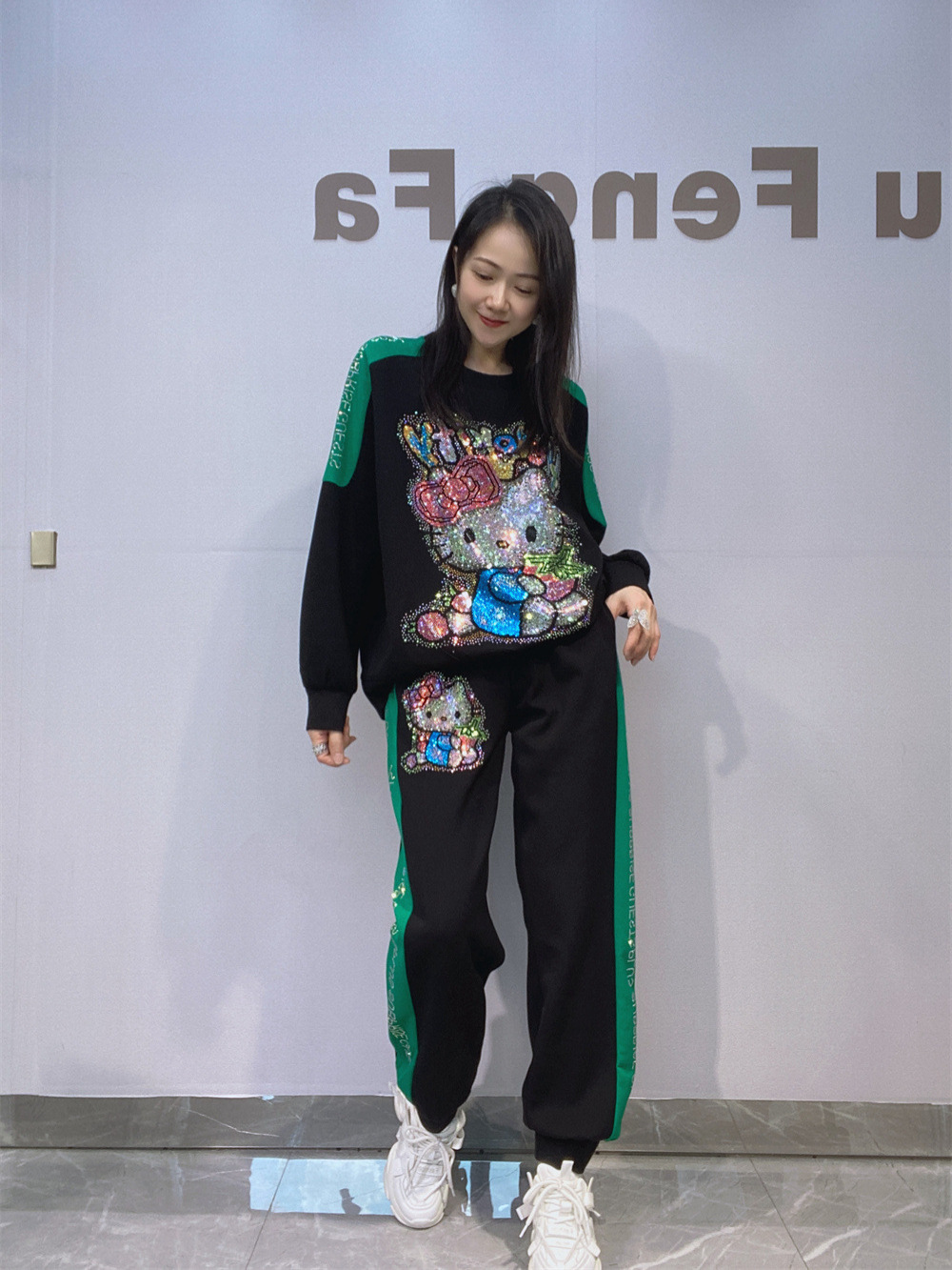 Trajes de moda de la estación europea de la industria pesada caliente taladro chaqueta de manga larga cintura elástica grande pantalones de caída de dos piezas para mujeres
