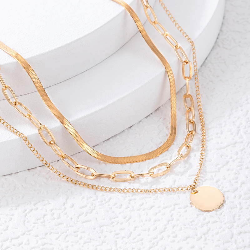 Simple Alloy Disc Hollow Multi-layer Necklace display picture 3