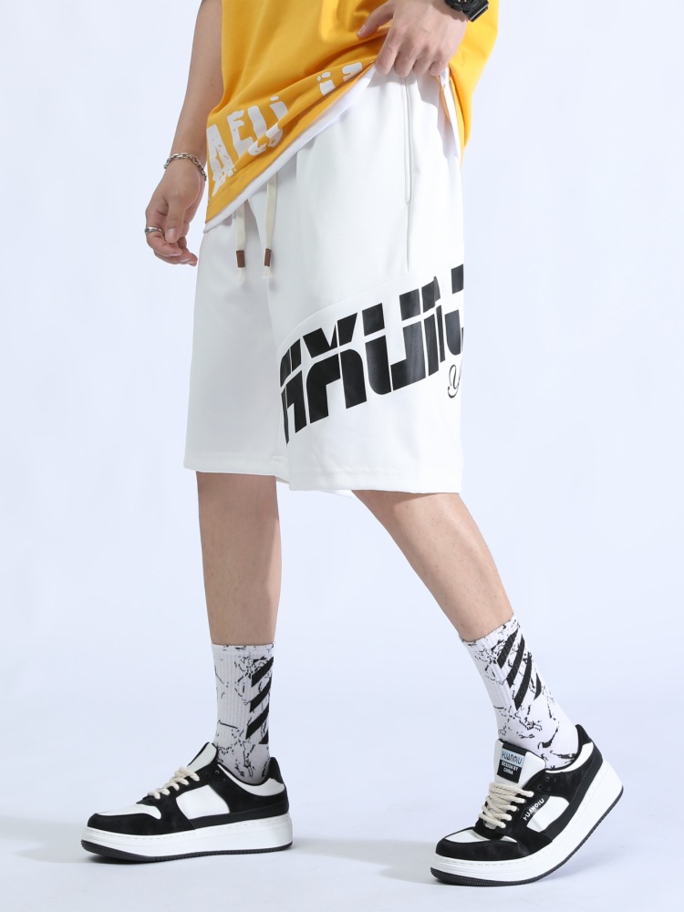 Pantalones cortos para niños verano 2025 nuevo suelto elástico de punto de moda pantalones deportivos juveniles de cinco puntos pantalones micro-elásticos